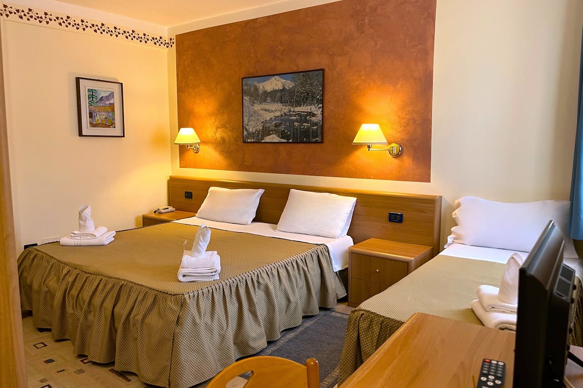 triple room | minibar, in-room safe, desk, blackout curtains