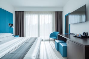 Chambre supérieure double, 1 très grand lit, non-fumeur | Coffre-fort, bureau, rideaux d’obscurcissement, système d’insonorisation