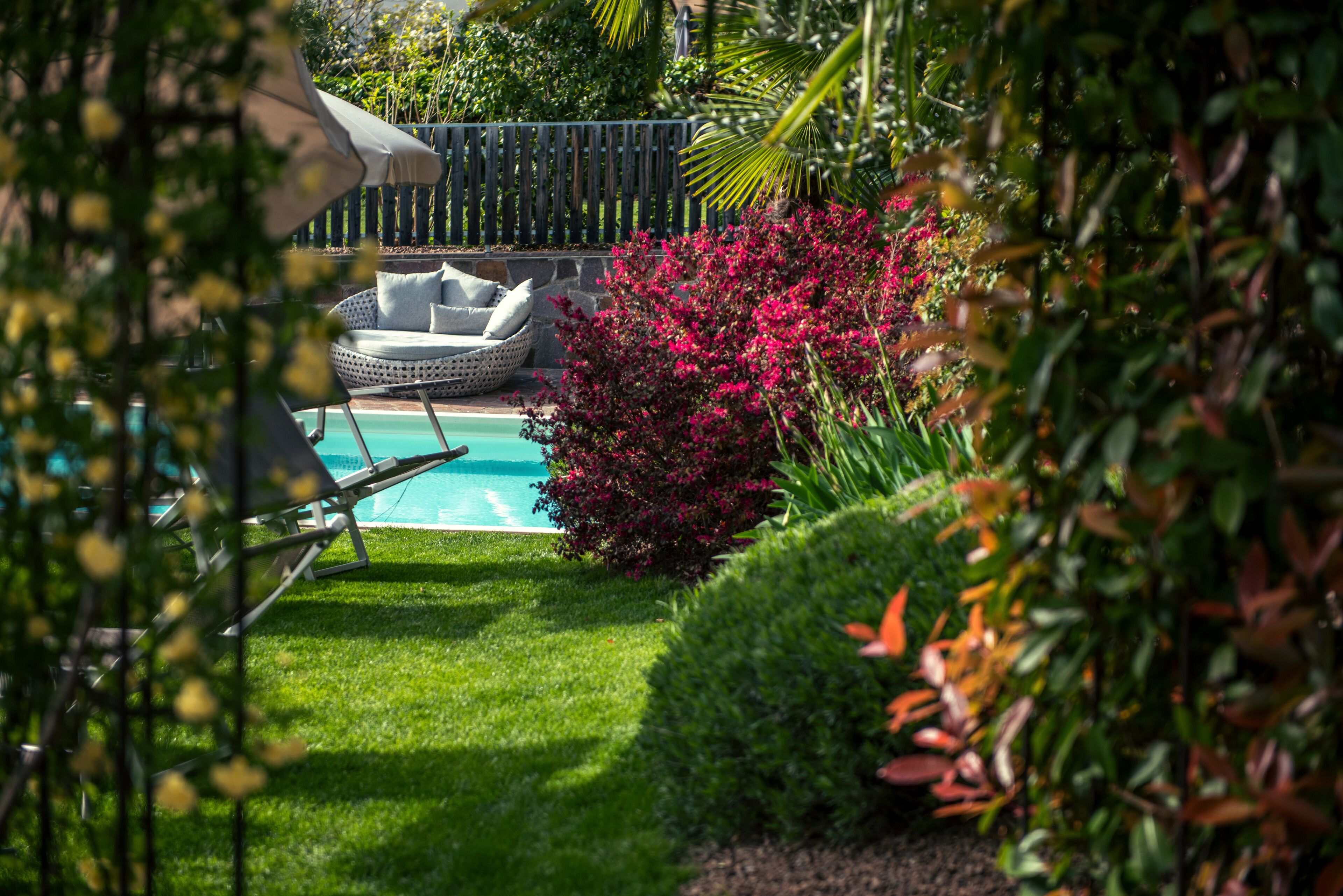 indoor pool, seasonal outdoor pool, pool umbrellas, pool loungers