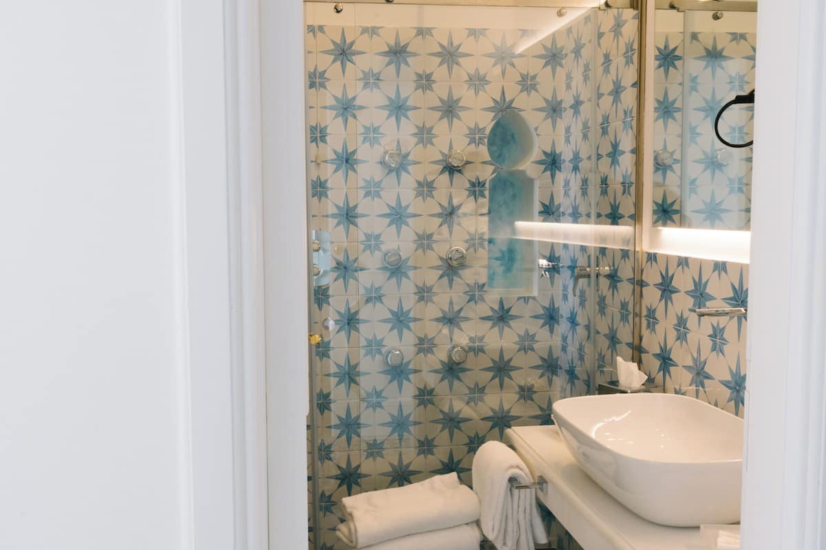 deluxe double or twin room, terrace, sea view | 1 bedroom, memory-foam beds, minibar, in-room safe