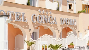 A hotel facade with the name 'HOTEL CONCA D'ORO' prominently displayed. - Hotel Conca D'oro (Positano)
