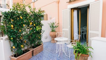 Deluxe Triple Room, 1 Bedroom, Sea View | 1 bedroom, Frette Italian sheets, premium bedding, memory-foam beds