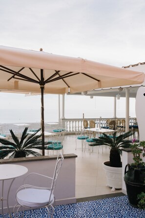 Deluxe Triple Room, 1 Bedroom, Sea View | Memory-foam beds, minibar, in-room safe, individually decorated