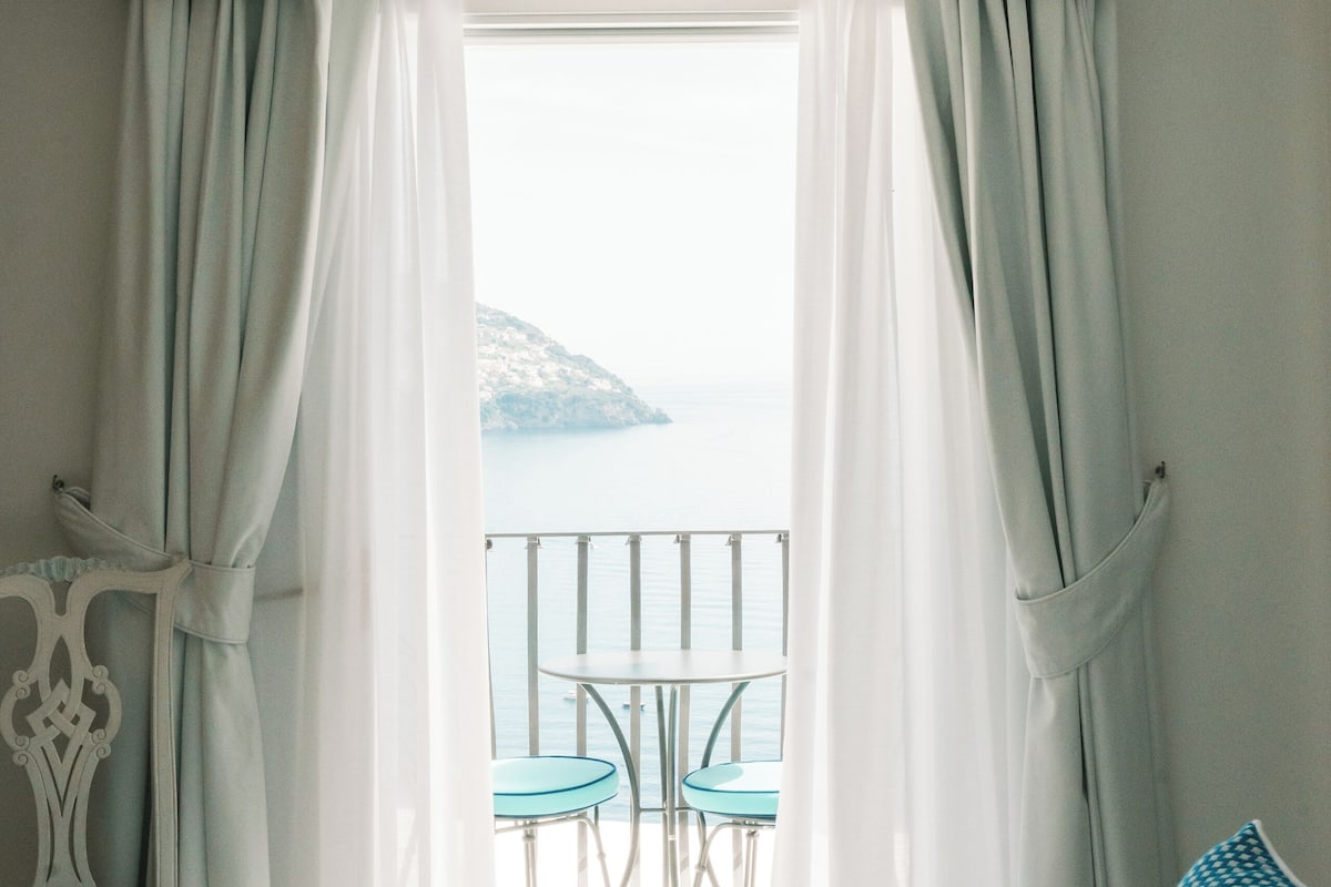 superior triple room, balcony, sea view | 1 bedroom, memory-foam beds, minibar, in-room safe