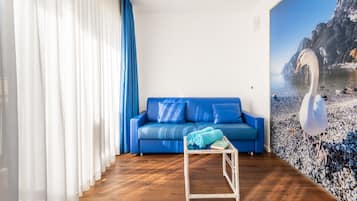 Chambre Double Deluxe | Coin séjour