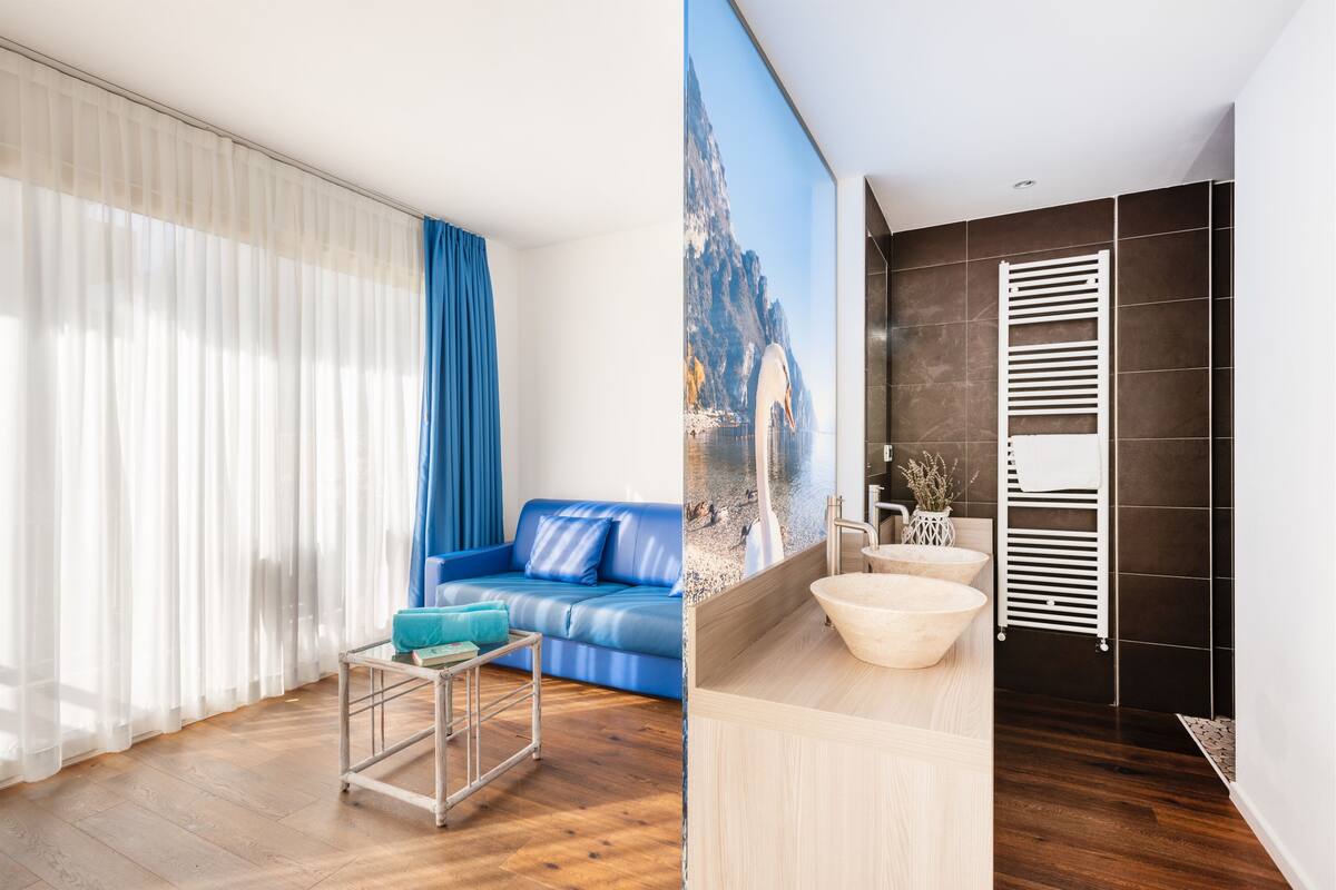 Deluxe Double Room, Balcony | Down comforters, in-room safe, desk, blackout drapes