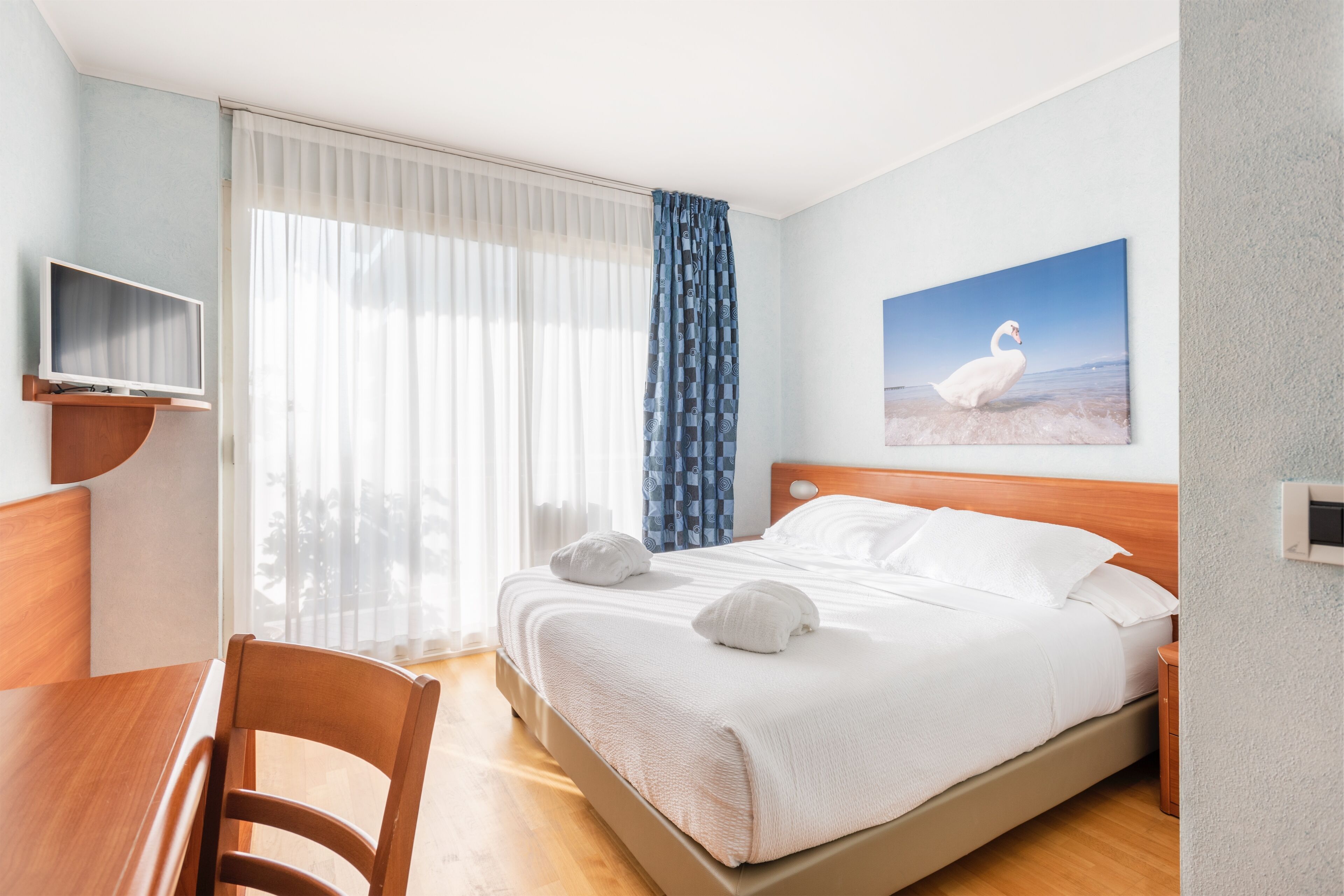 Standard Double or Twin Room | Down comforters, in-room safe, individually decorated, desk