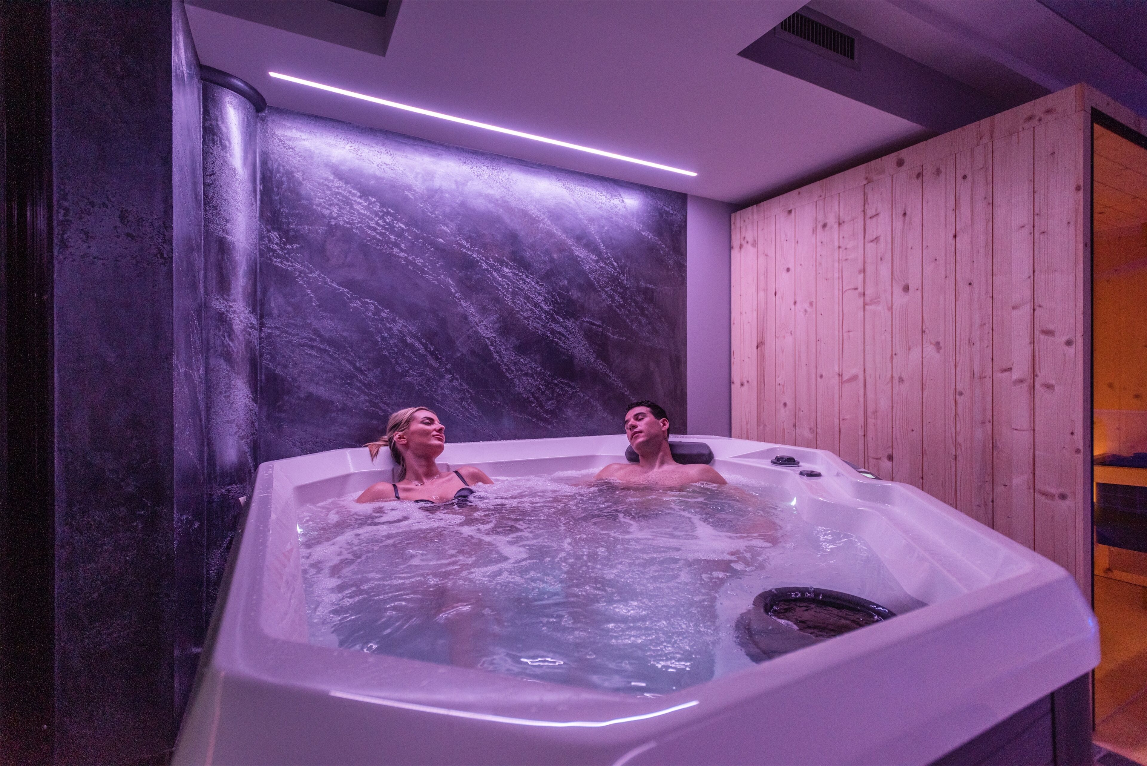 sauna, hot tub, steam room, deep-tissue massages, prenatal massages