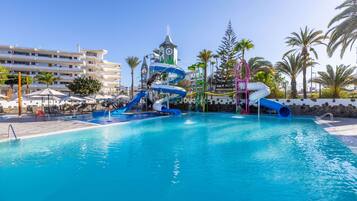 Enjoy a refreshing swim in our pool with a thrilling water slide and scenic views.