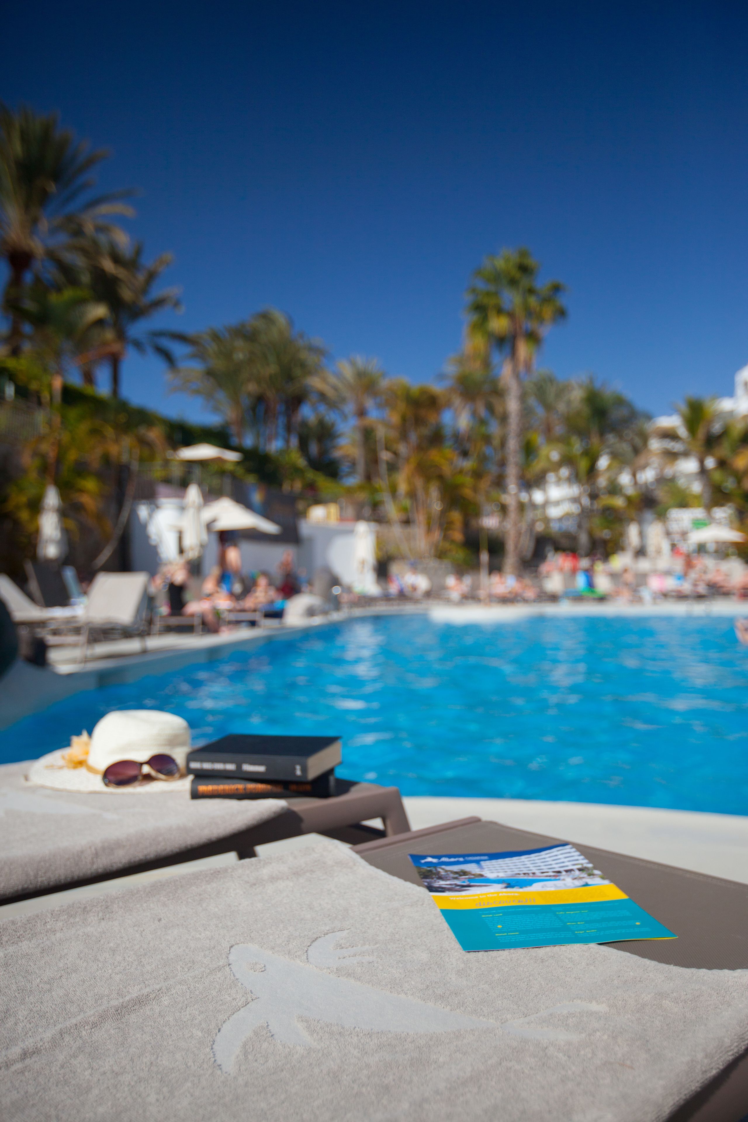 4 outdoor pools, pool umbrellas, pool loungers