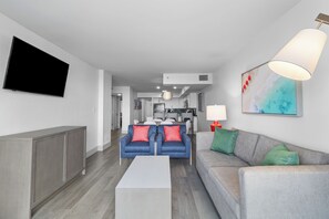 Pinnacle Oceanfront Deluxe Two Bedroom Condo - PH | Living area | Flat-screen TV