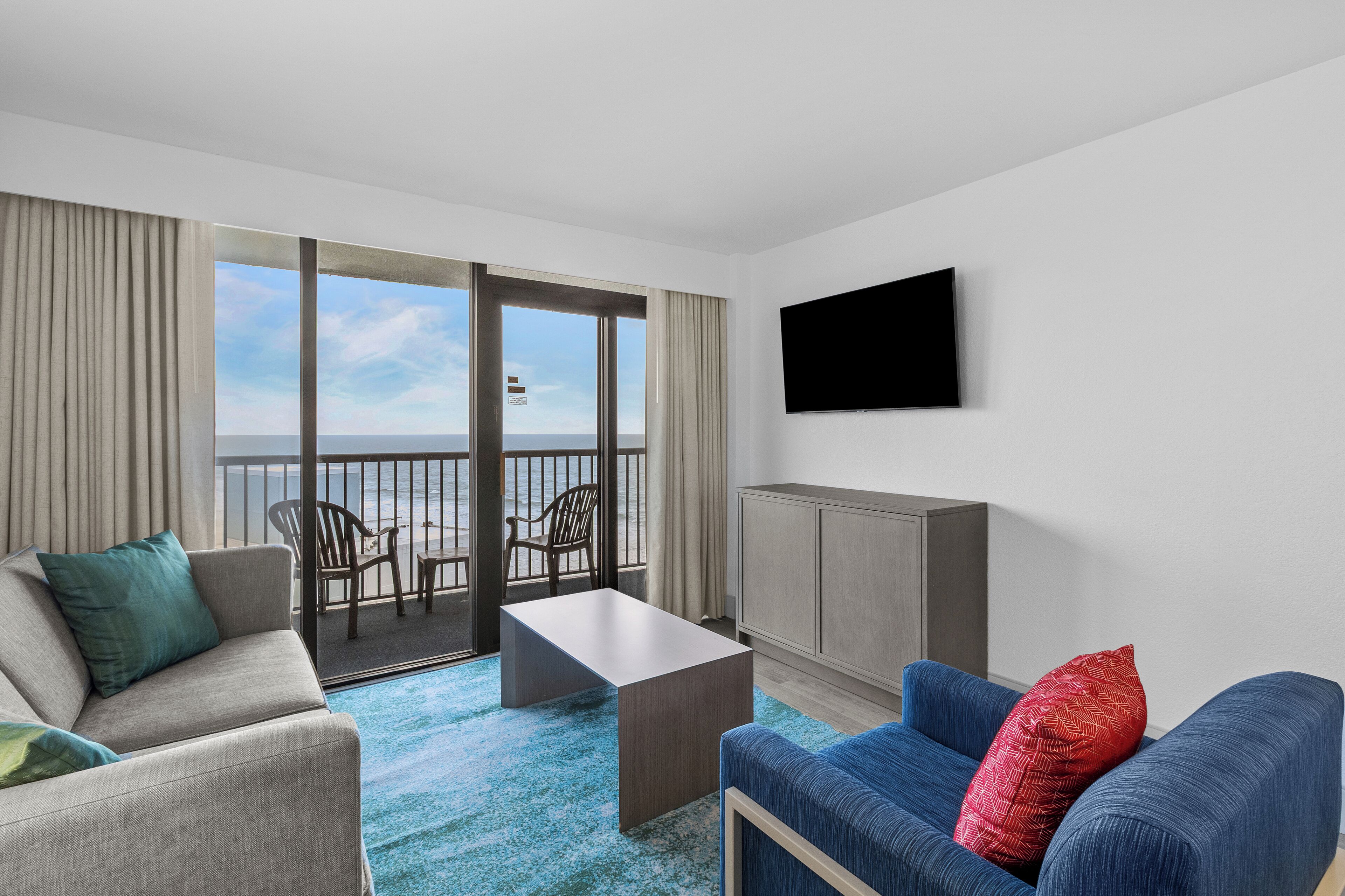 Mariner Ocean View Deluxe Two Bedroom Condo | Living area | Flat-screen TV