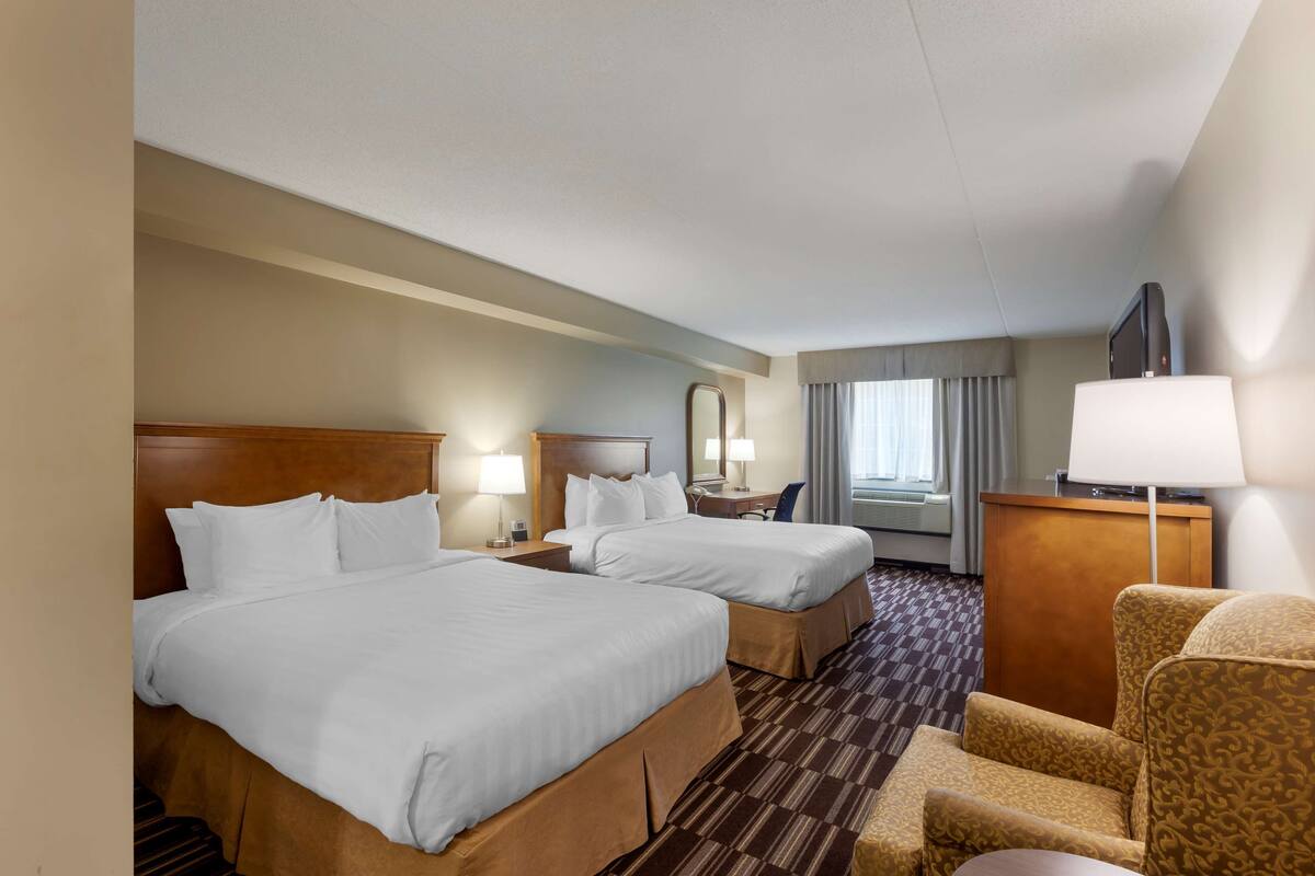 Premium bedding, pillowtop beds, in-room safe, blackout drapes
