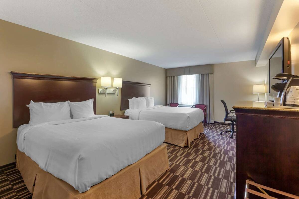 Premium bedding, pillowtop beds, in-room safe, blackout drapes