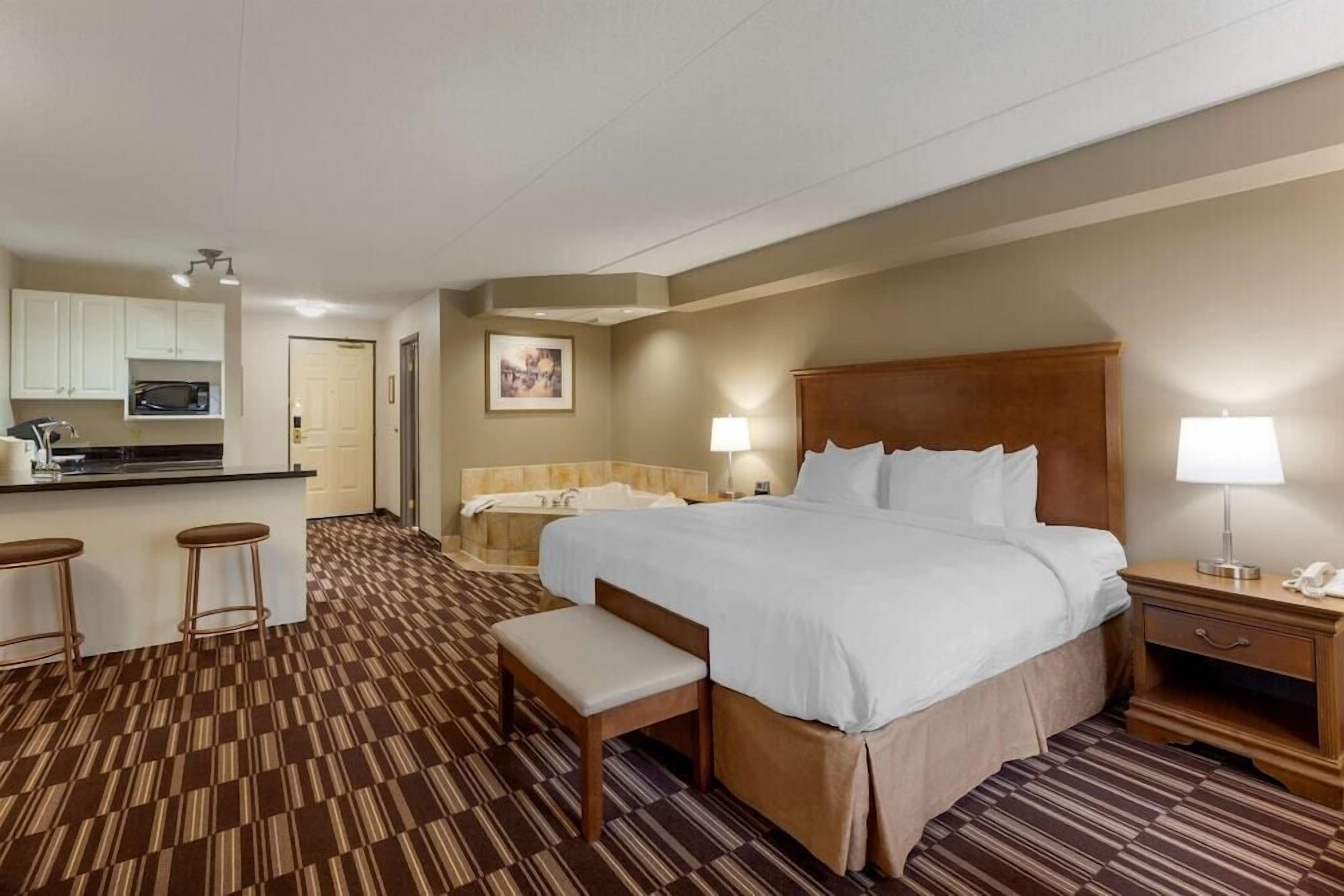 Premium bedding, pillowtop beds, in-room safe, blackout drapes