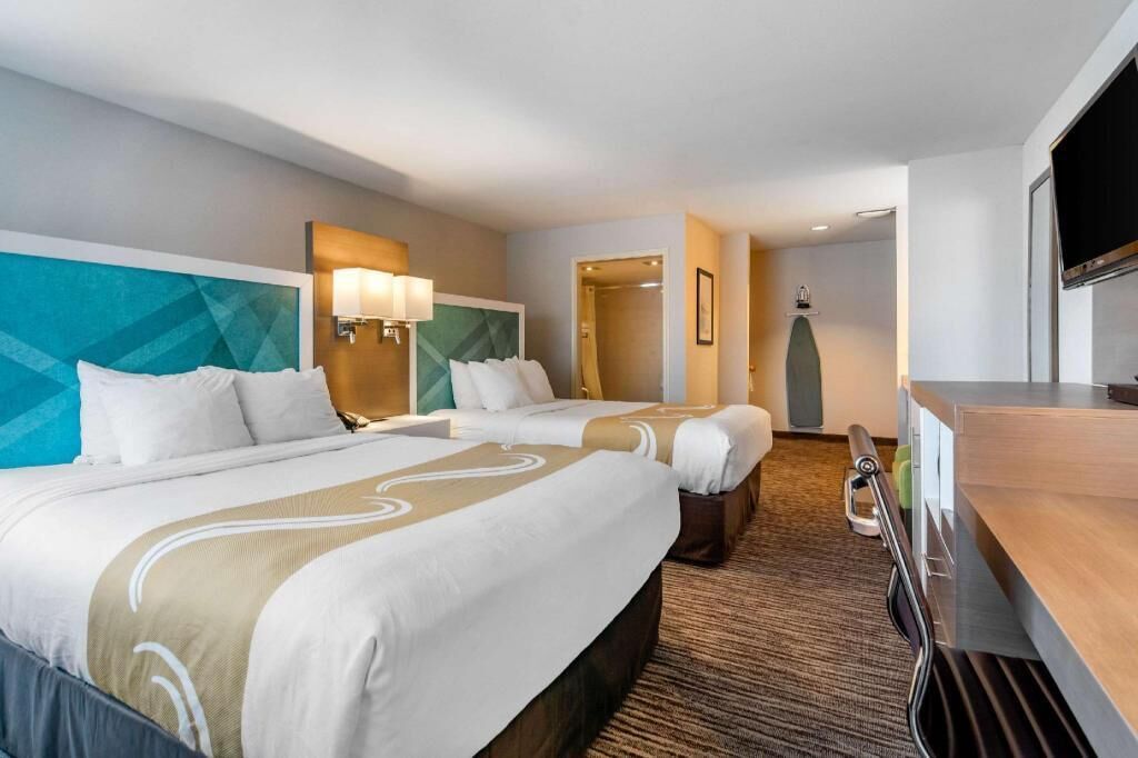 Desk, blackout drapes, iron/ironing board, cribs/infant beds