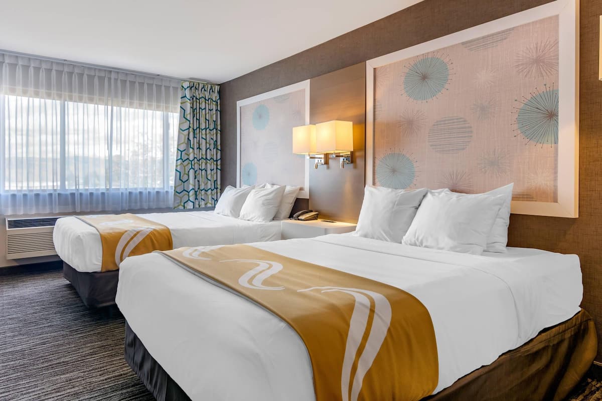 Standard Room, 2 Queen Beds, Non Smoking | Desk, blackout drapes, iron/ironing board, cribs/infant beds