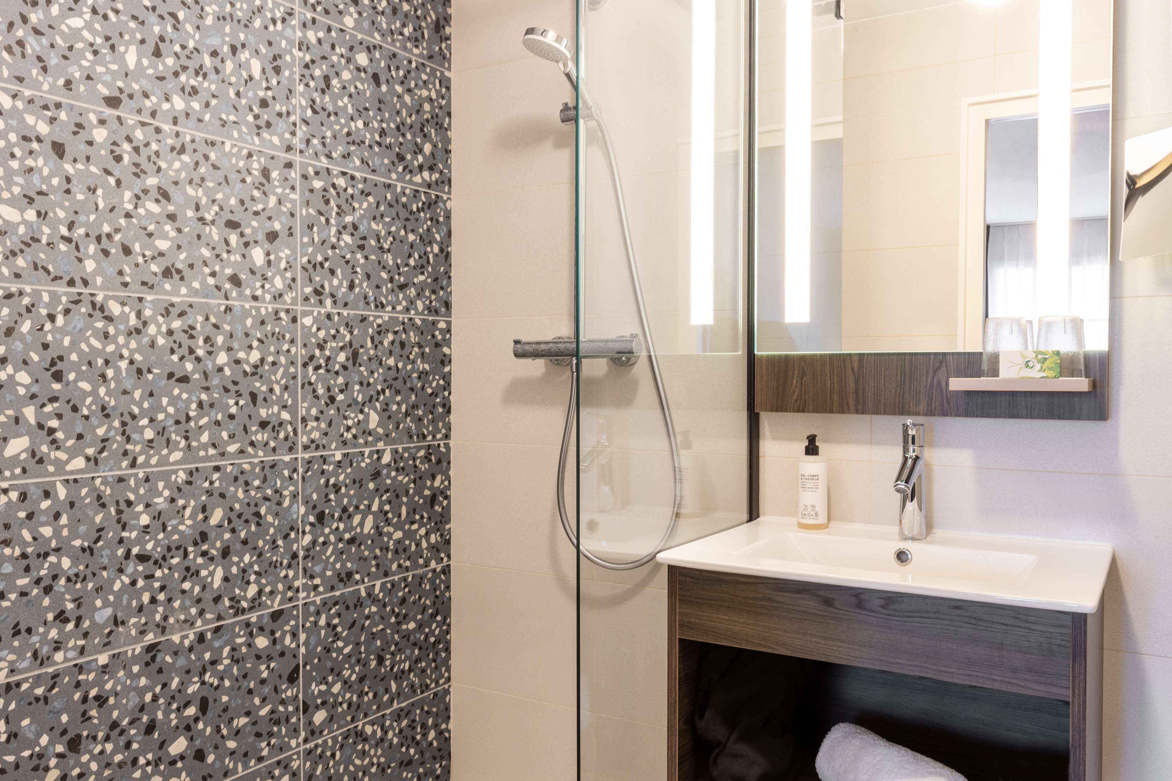 bathtub, free toiletries, hair dryer, towels