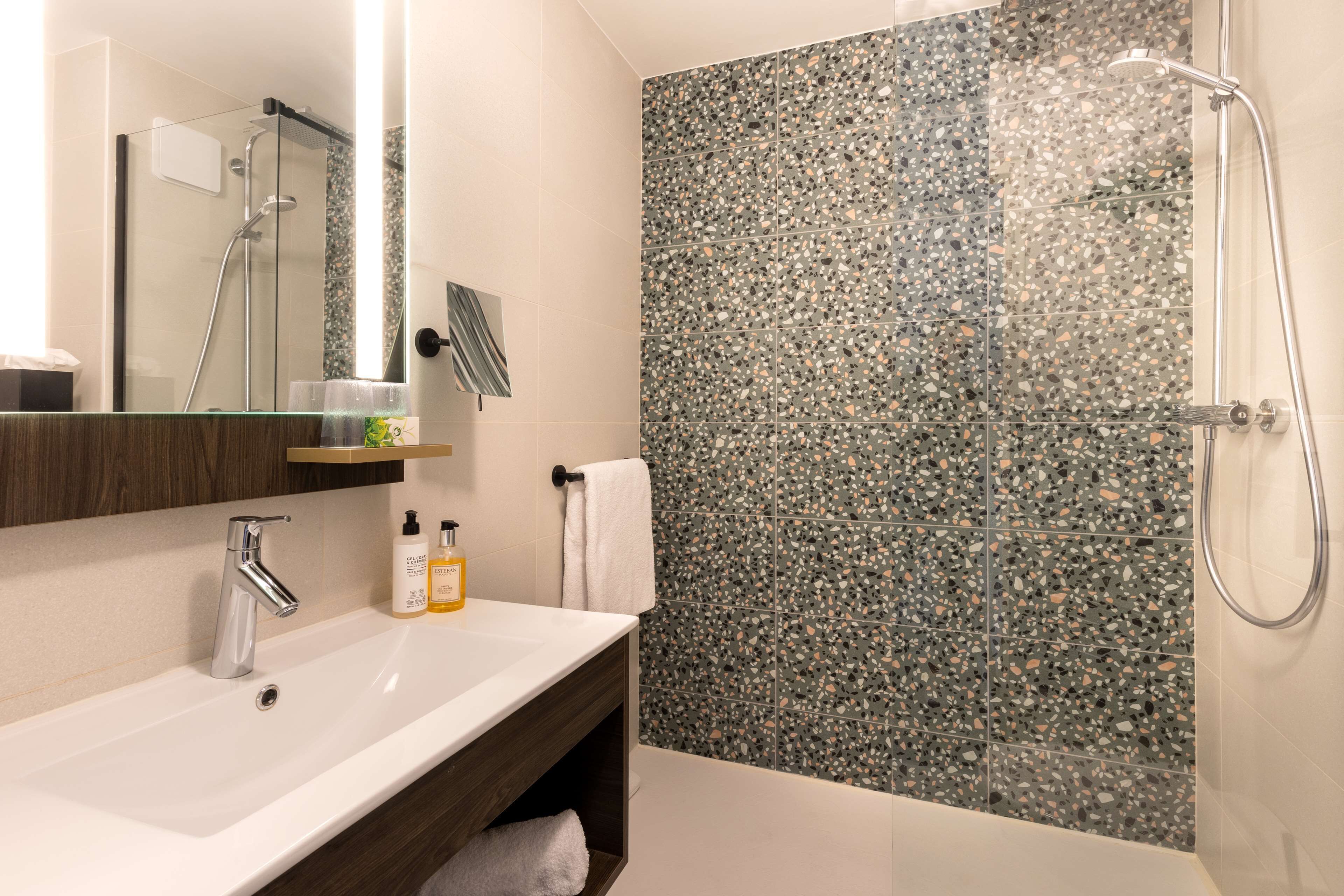 bathtub, free toiletries, hair dryer, towels