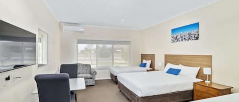 Standard Room, Non Smoking (1 Queen & 1 Single Bed) | Desk, laptop workspace, blackout curtains, soundproofing