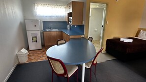 Self Contained Suite For 4 (Upstairs) | 1 bedroom, individually furnished, blackout drapes, iron/ironing board