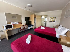 Standard Twin Room (Upstairs) | 1 bedroom, individually furnished, blackout drapes, iron/ironing board - The Q Motel (Allenstown)