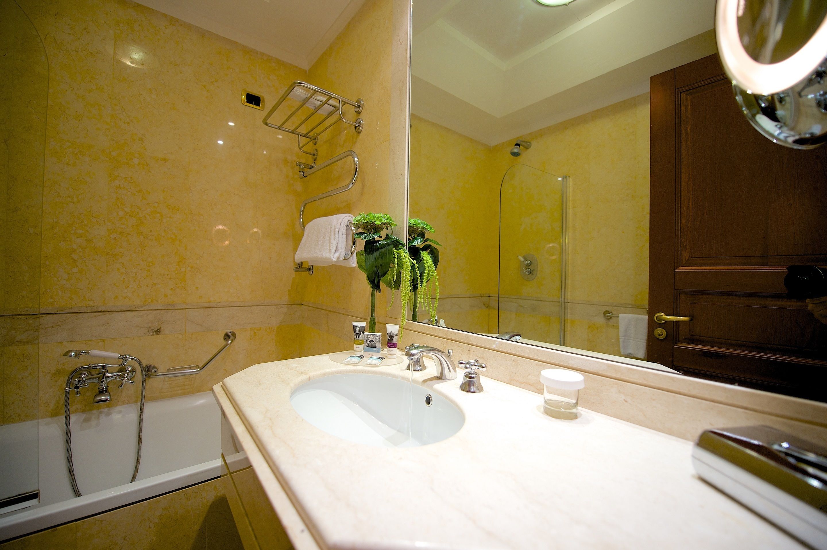 deep-soaking bathtub, rainfall showerhead, free toiletries, hair dryer