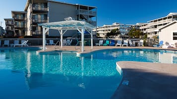 Indoor pool, pool umbrellas, pool loungers