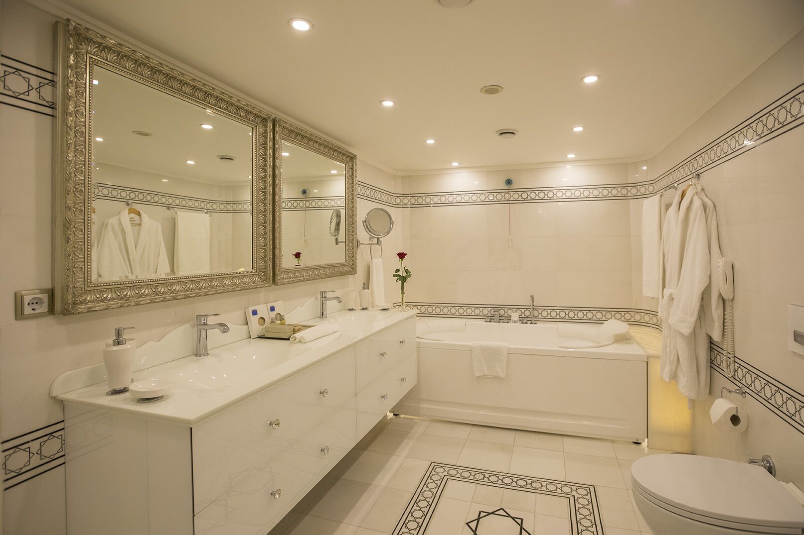 presidential suite, multiple bedrooms, jetted tub, city view | bathroom | shower, free toiletries, hair dryer, bathrobes