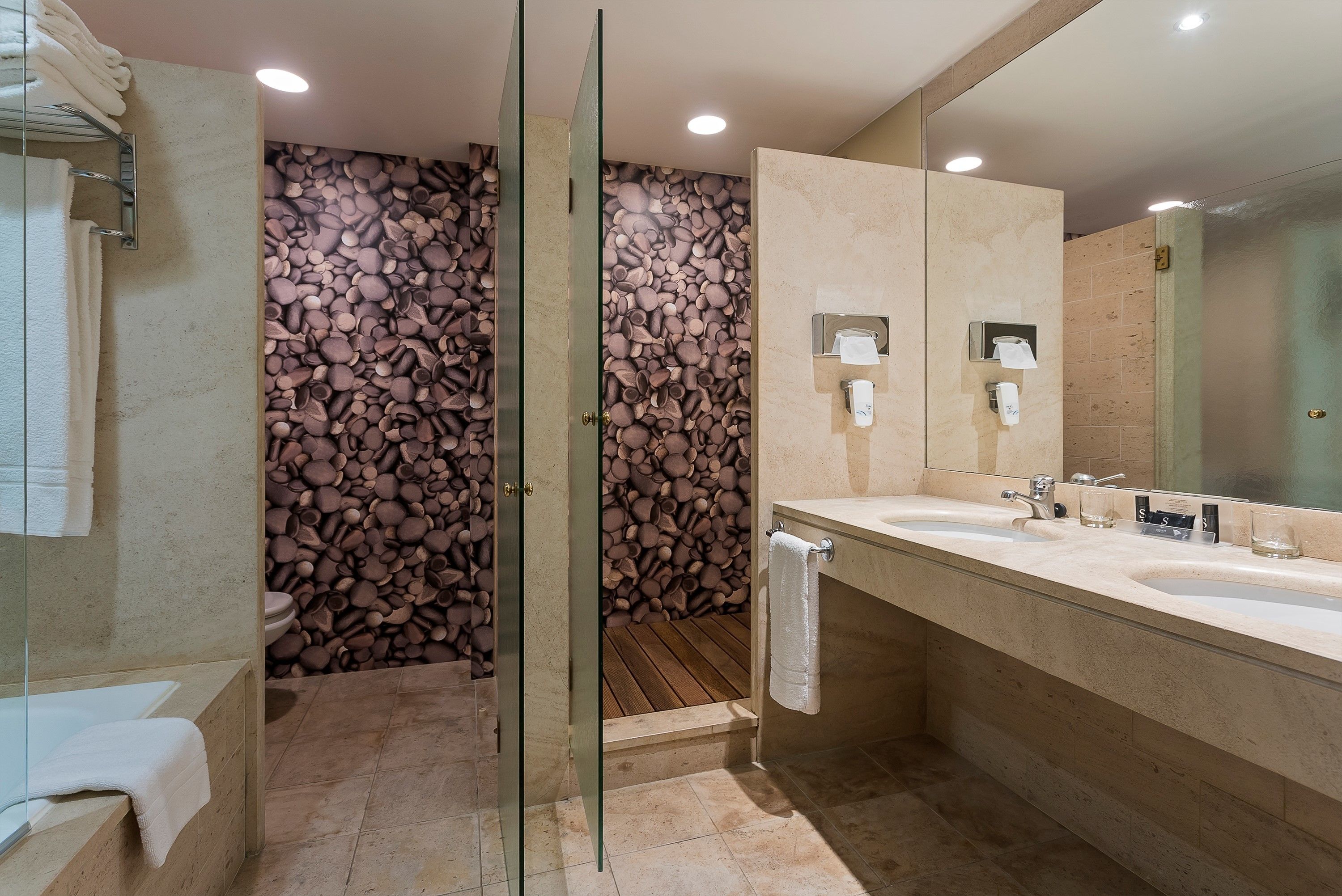 family room | bathroom | combined shower/bathtub, free toiletries, hair dryer, bathrobes
