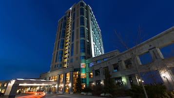 Experience the sleek, modern architecture of this high-rise hotel, featuring spacious balconies and expansive windows.