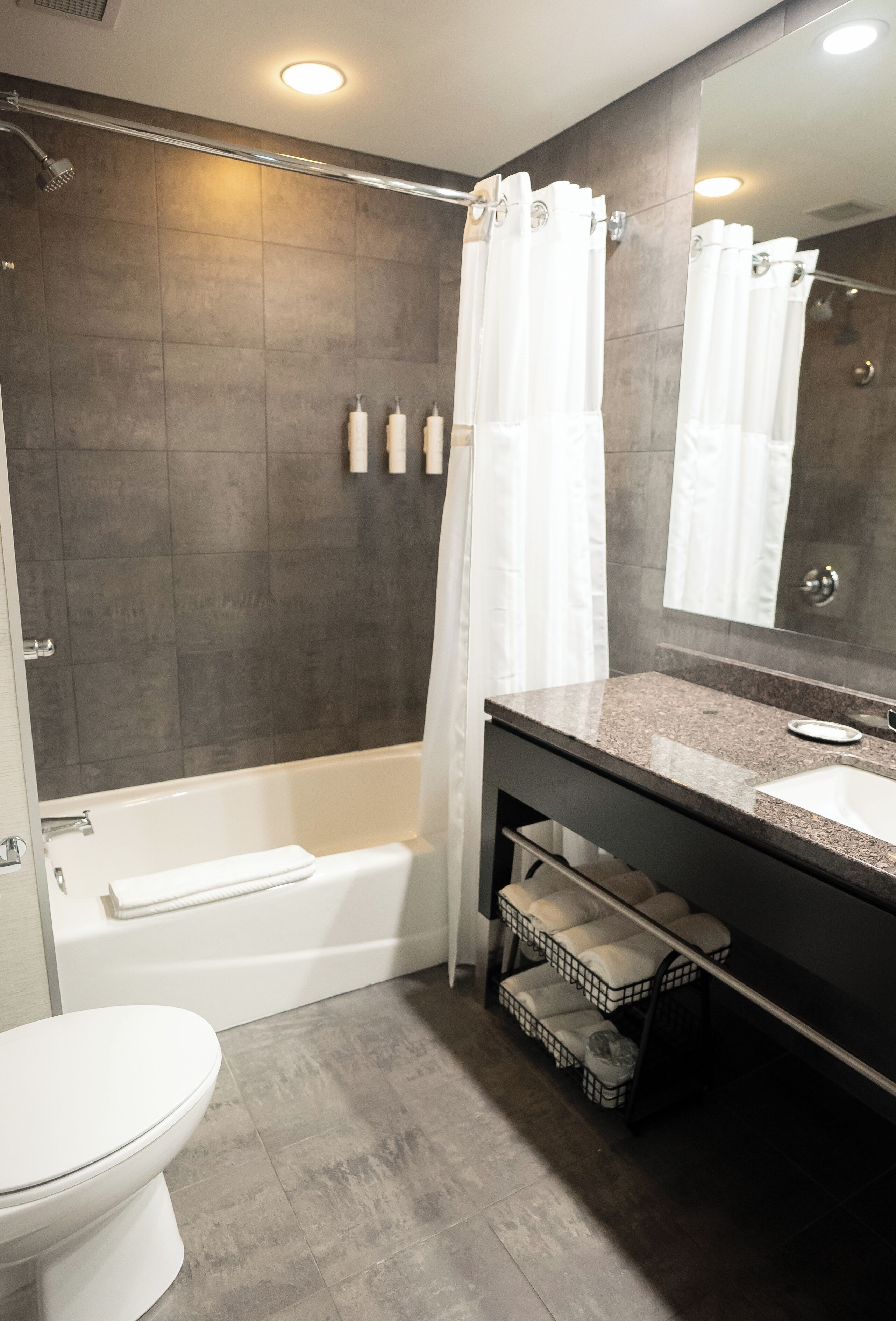 standard room, 2 queen beds | bathroom | shower, designer toiletries, hair dryer, bathrobes