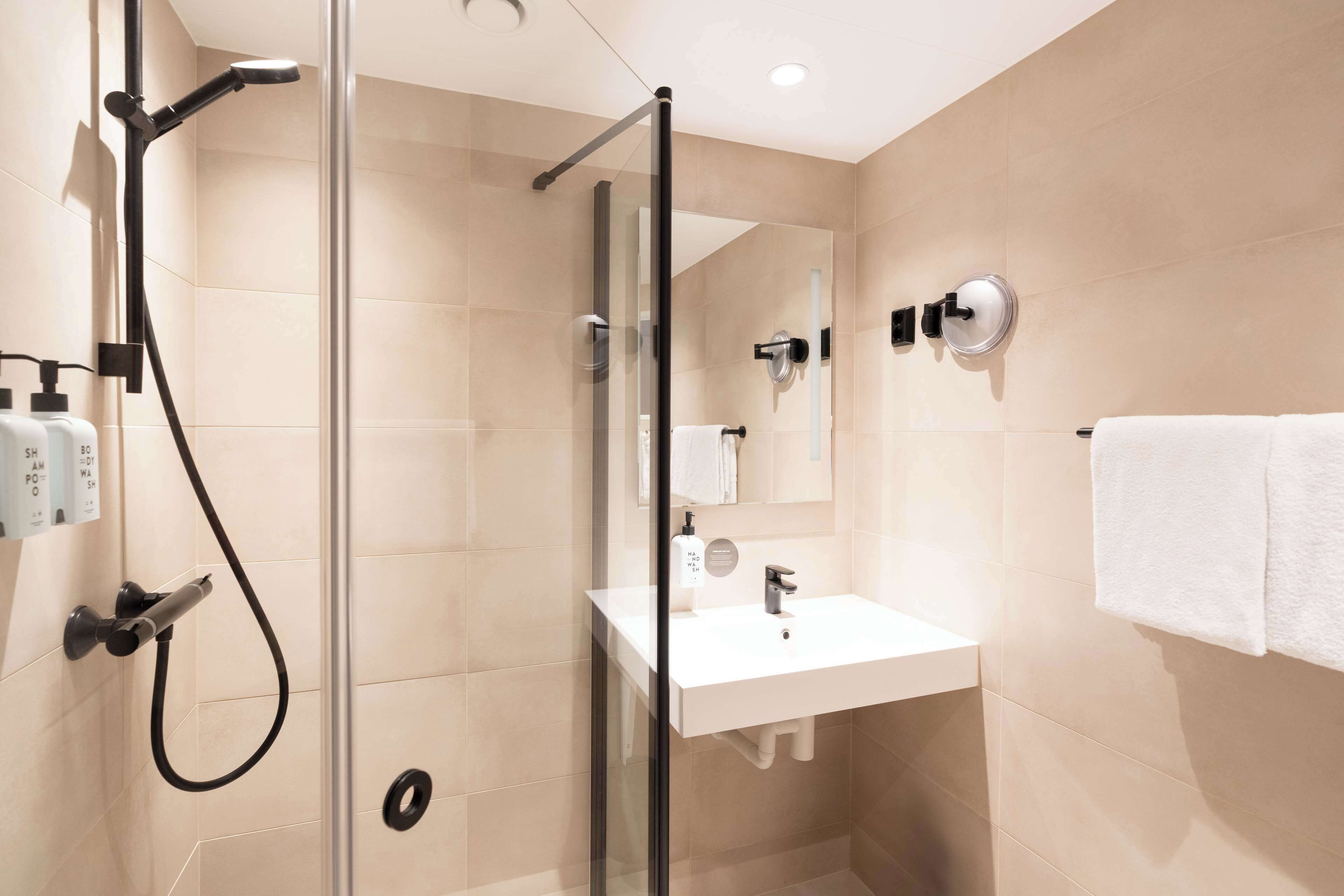 twin room | bathroom | hair dryer, towels, soap, shampoo