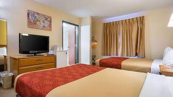 Coffre-fort, rideaux d’obscurcissement, fer et planche à repasser