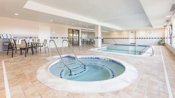 Indoor pool, open 6:00 AM to 11:00 PM, pool loungers