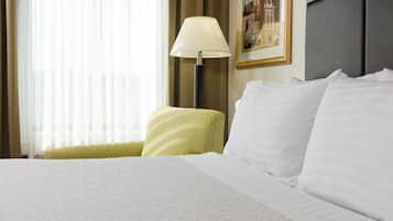 Desk, laptop workspace, blackout drapes, iron/ironing board