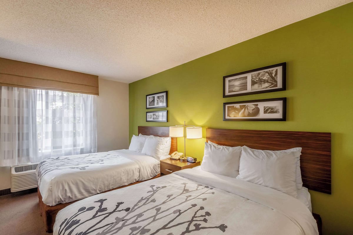 suite, multiple beds, non smoking | desk, blackout curtains, iron/ironing board, free cots/infant beds