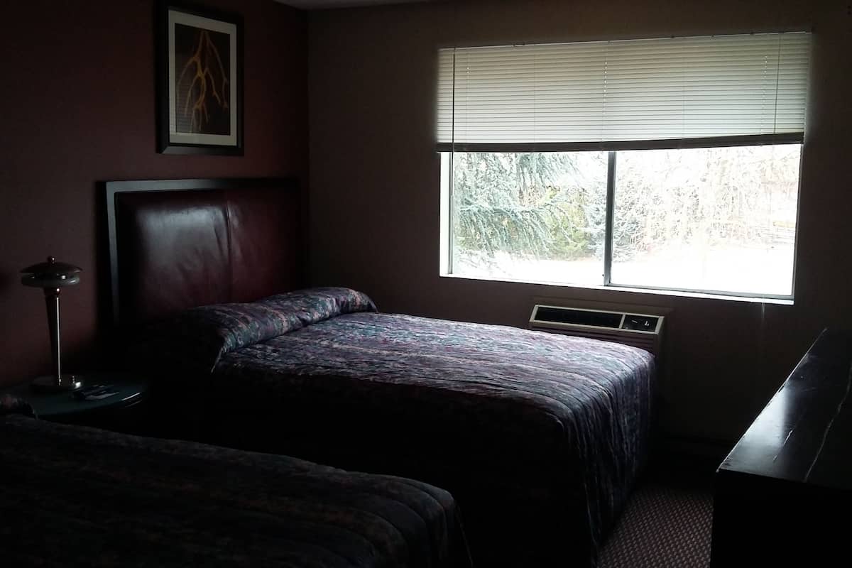 Economy Room, 2 Double Beds | In-room safe, free WiFi