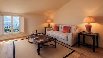 Superior Suite, Hill View | Living area | 24-inch TV with satellite channels