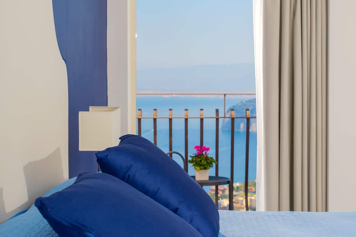 deluxe room, terrace, sea view | down duvets, in-room safe, desk, blackout curtains