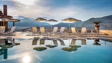 Outdoor pool, pool umbrellas, pool loungers