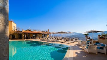 Outdoor pool, pool umbrellas, pool loungers