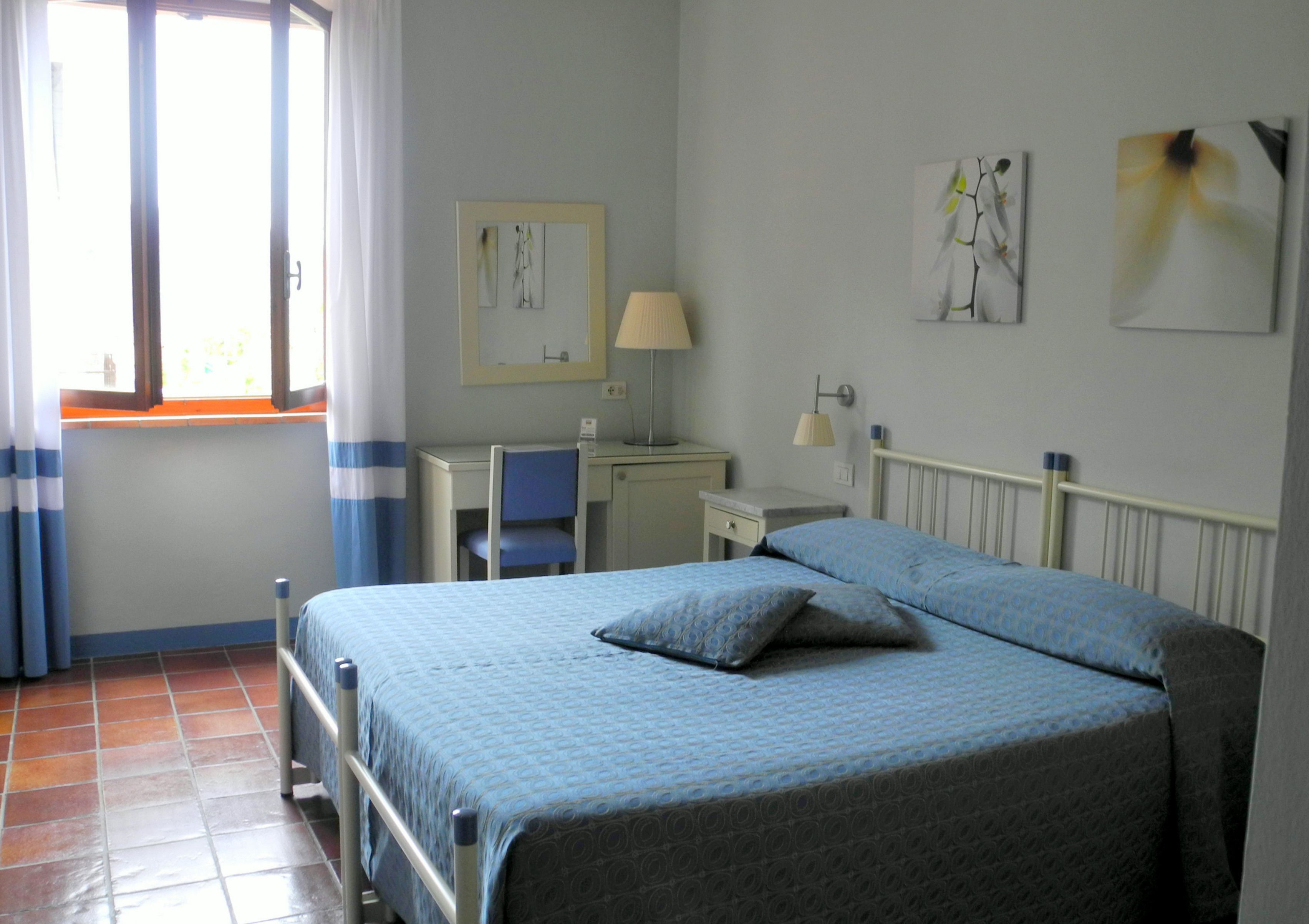 standard triple room | minibar, in-room safe, desk, blackout curtains