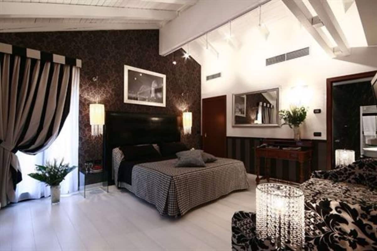 Suite Junior | Minibar, una cassaforte in camera, tende oscuranti, ferro/asse da stiro
