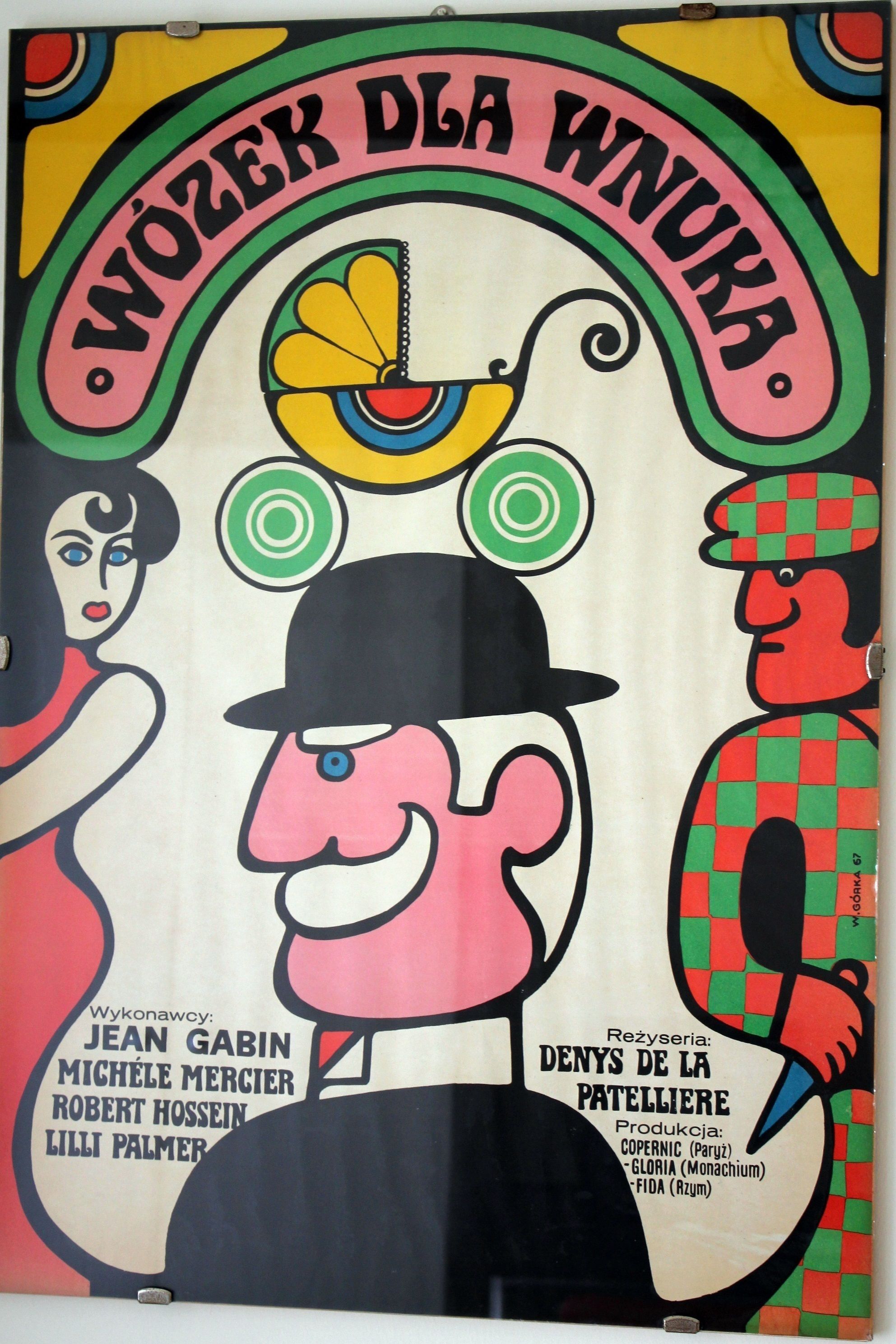 A colorful poster with cartoon characters and text in a foreign language.