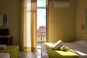 Standard Triple Room | 1 bedroom, minibar, individually decorated, desk