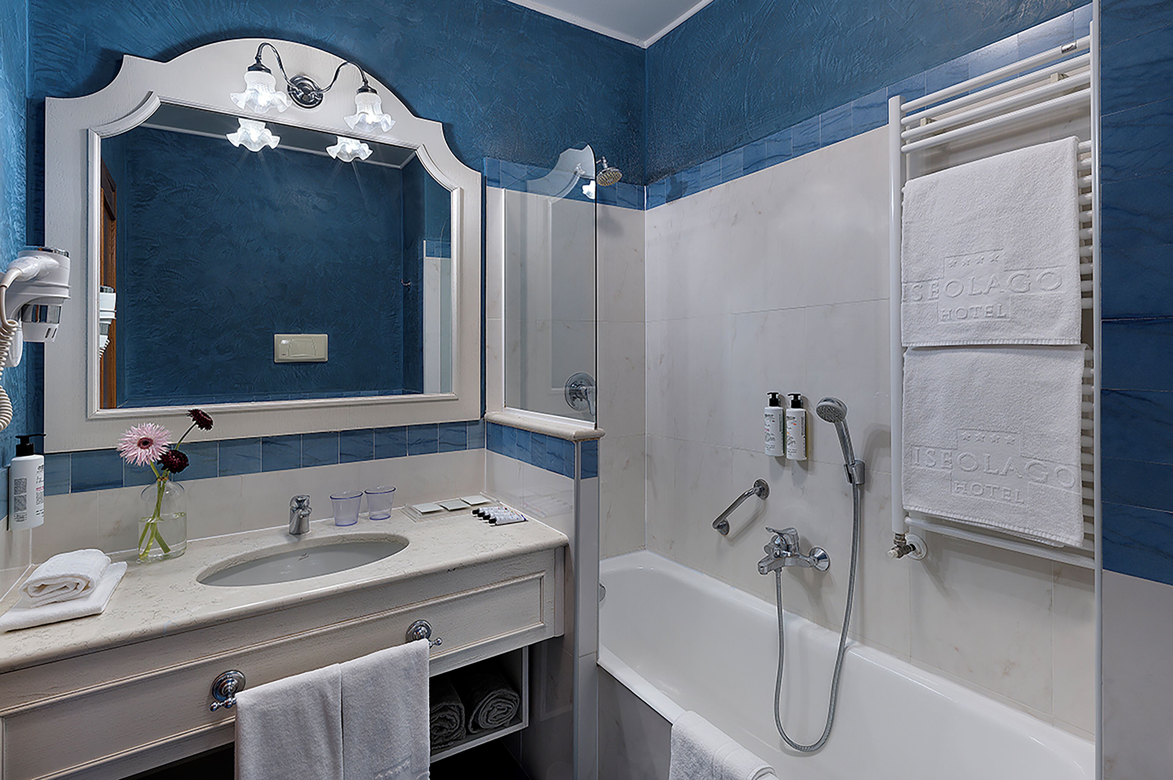 eco-friendly toiletries, hair dryer, bidet, towels