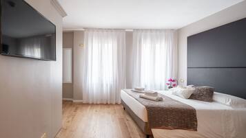 Chambre Triple Luxe, 1 chambre | Vue de la chambre