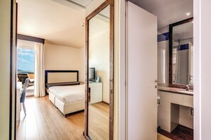 Premium bedding, down duvets, in-room safe, desk