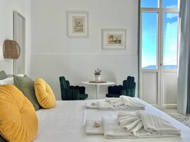 Superior Quadruple Room, Sea View | Hypo-allergenic bedding, down comforters, minibar, desk